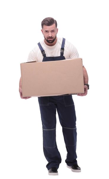 in full growth. a smiling man with cardboard boxes on his shoulders - Foto, immagini