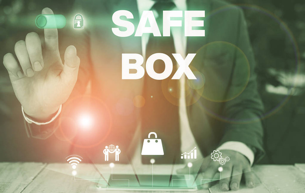 Conceptual hand writing showing Safe Box. Business photo showcasing A small structure where you can keep important or valuable things Male wear formal suit presenting presentation smart device. - Photo, Image