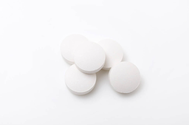 White tablets on White background. - Foto, immagini