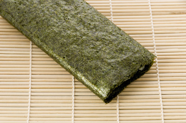 dried laver seaweed, bamboo mat - Photo, Image