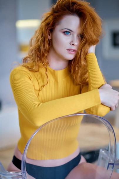 Portrait of woman with long curly beautiful ginger hair.  - Foto, Bild