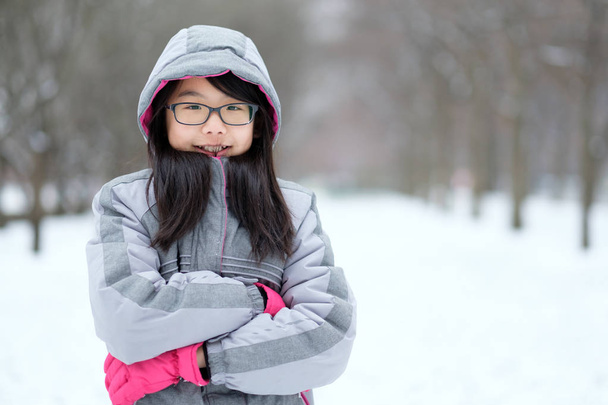 Portrait of Asian teen in winter - Photo, Image