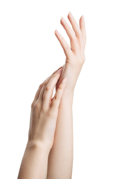 Όμορφες γυναίκες χέρια εφαρμογή κρέμα, μασάζ απομονωμένη - Φωτογραφία, εικόνα
