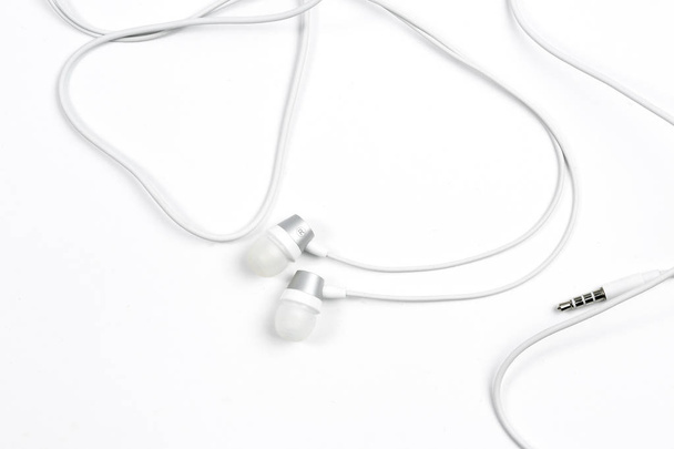 wired headphones on white isolated background - Foto, Imagem