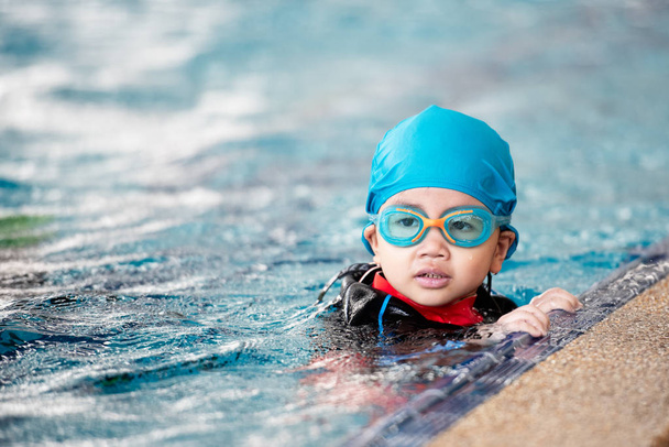 One girl wearing practice swimming. - Photo, Image