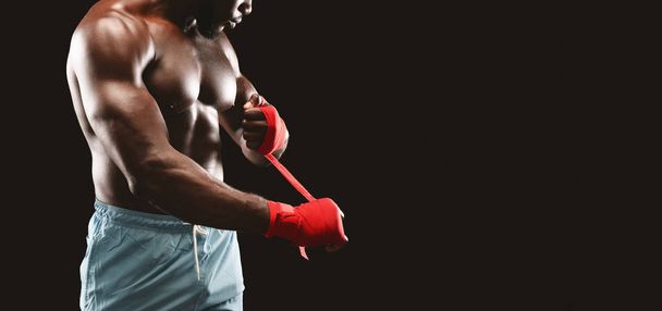 Cropped image of boxer getting ready for fight - Photo, Image