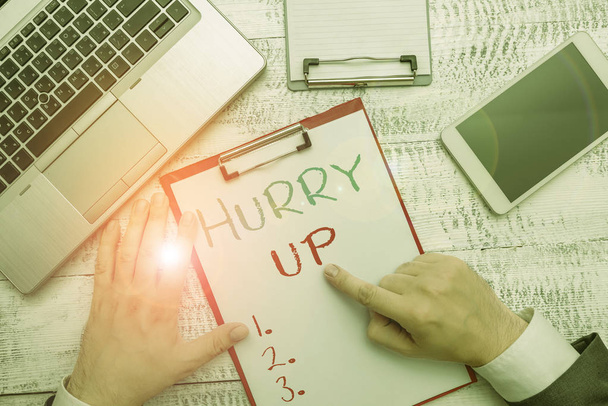 Conceptual hand writing showing Hurry Up. Business photo showcasing asking someone to do a job very fast Quickly Lets go Encourage. - Photo, Image