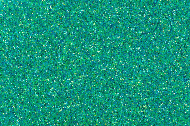 New stylish texture, holographic glitter background in greeny tone. - Photo, Image