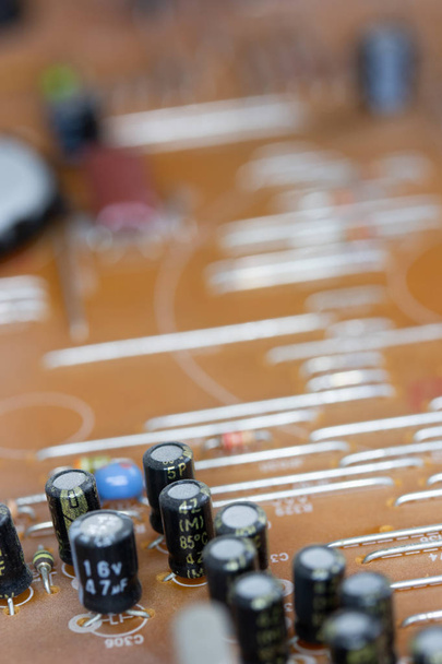 Close up de placa de circuito impresso Bakelite laranja
 - Foto, Imagem