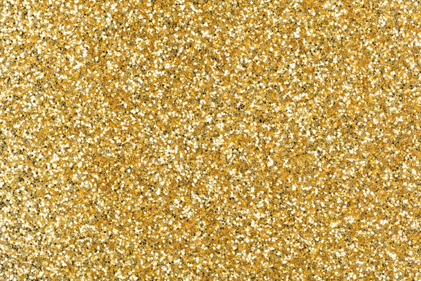 Excellent glitter texture in shiny gold color as part of your individual design work. - Photo, Image