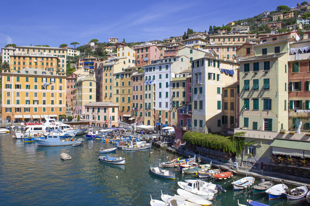 Colorful buildings and beach at Camogli on sunny summer day, Liguria - Photo, Image