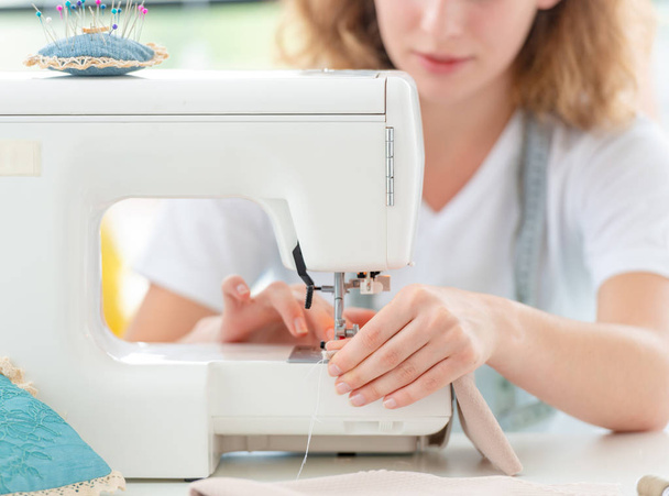Dressmaker sewing new design by hands - Foto, Imagem