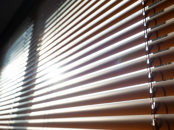 Blinds,Interior room decoration in living with sunlight,Material plastic brown,back ground - Foto, Bild