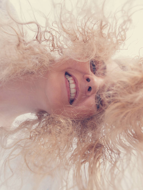 Woman with wet blonde hair - Fotoğraf, Görsel