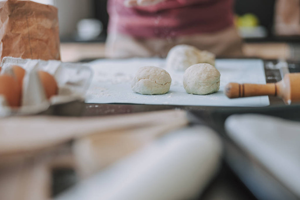 Cook preparing scones for breakfast with friends - Fotoğraf, Görsel