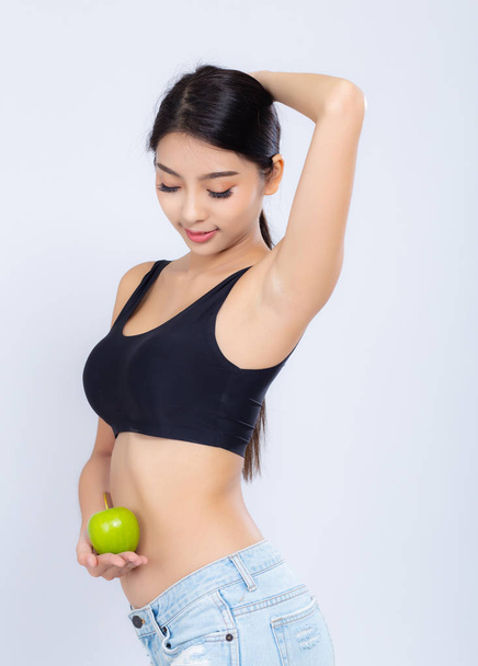 Muotokuva aasialainen nainen hymyilee tilalla vihreä omena hedelmiä ja kaunotar
 - Valokuva, kuva