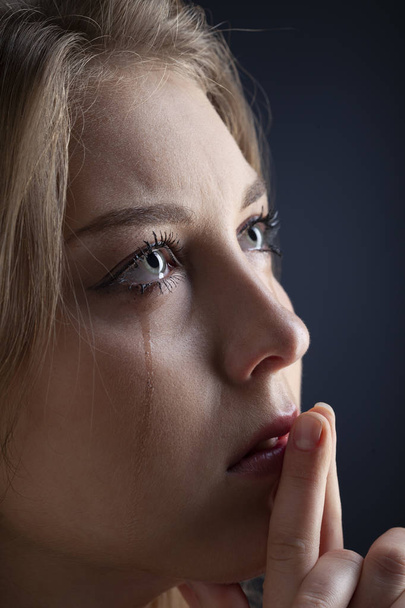 Close up eye woman crying with tears - Фото, изображение