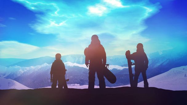 Familia de snowboarders en la cima de la montaña
. - Foto, Imagen