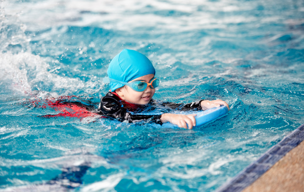 One girl wearing practice swimming. - Photo, Image