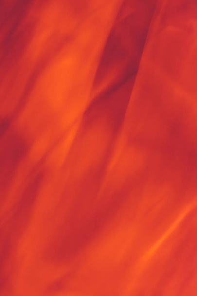 Оранжевый фон, фактура огненного пламени и волна.
 - Фото, изображение
