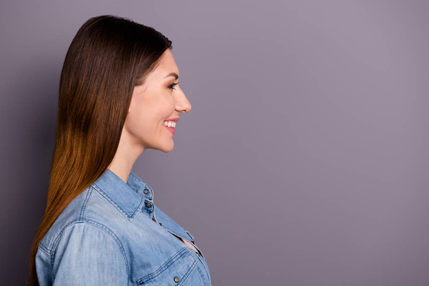 Profile side photo of positive cheerful lady feel content have weekends free time wear jeans denim trendy clothes isolated over grey color background - Fotoğraf, Görsel