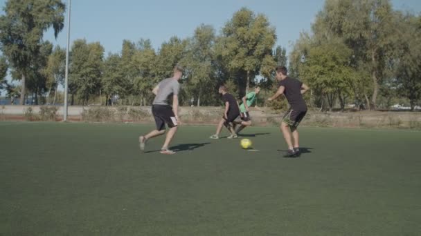 Football striker scoring a goal during match - Felvétel, videó