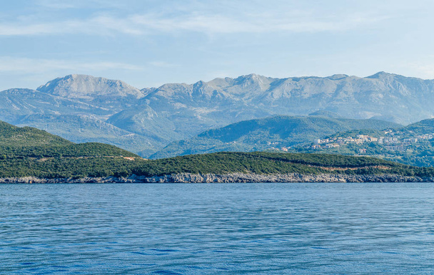 Budva Riviera in Montenegro, view from the sea on a sunny day - Fotografie, Obrázek