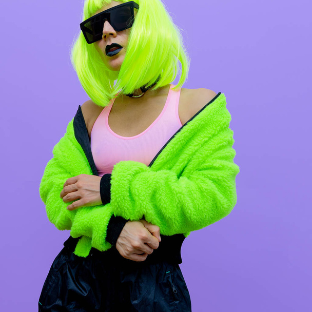 Fashion hipster Model. Clubbing style. Street swag outfit. Neon  - Foto, Bild