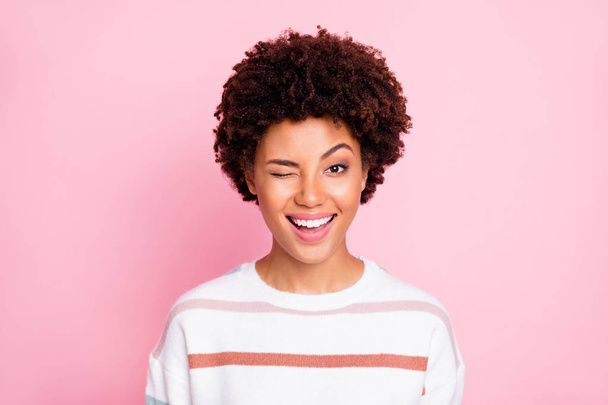 Photo of flirty cheerful charming fascinating cute black girlfriend blinking you smiling toothily beaming shine isolated over pink pastel color background - Foto, Imagen