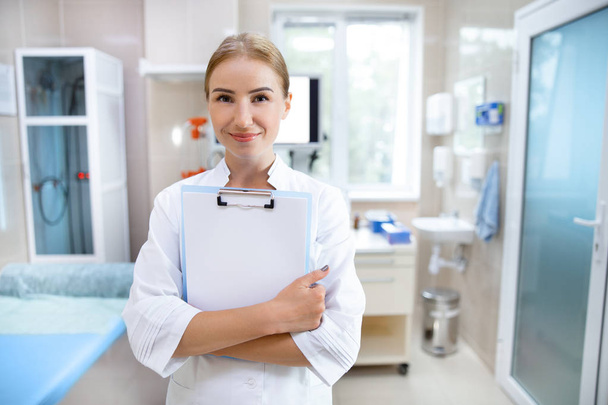 Young doctor working with modern equipment stock photo - Photo, image