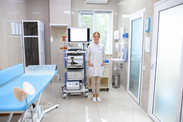 Welcoming female professional in ultrasound office stock photo - Foto, Imagen