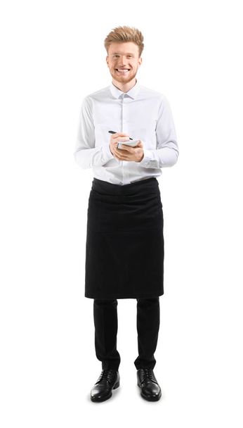 Handsome waiter with notebook on white background - Foto, imagen