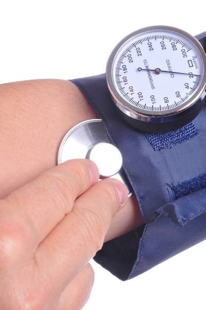 Kontrola ciśnienia krwi za pomocą Sphygmomanometer  - Zdjęcie, obraz