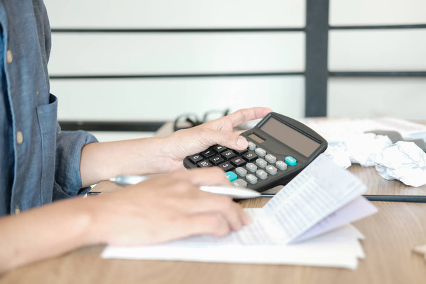 man calculate domestic bills. Businessman with calculator checki - Photo, Image