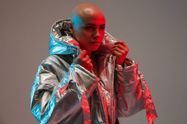 Portrait of an attractive bald woman wearing warm jacket - Foto, Bild
