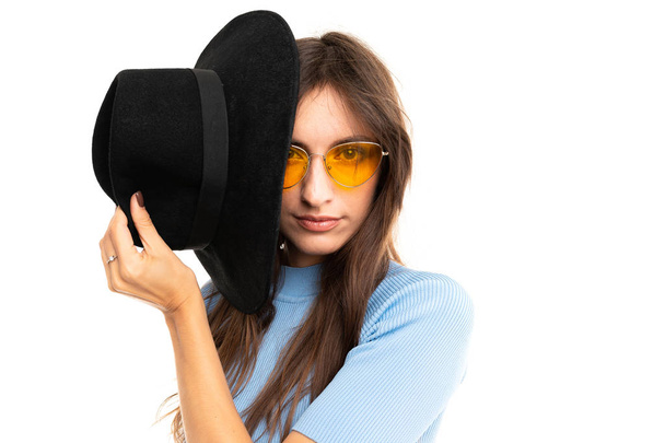 beautiful fashionable woman in hat and eyeglasses  - Фото, зображення