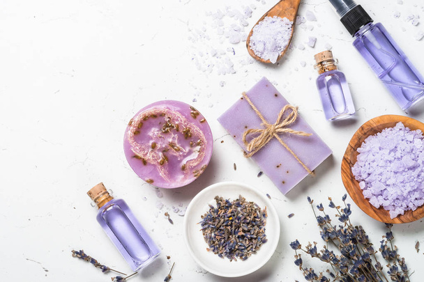 Lavender cosmetics on white top view. - Fotó, kép