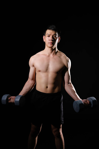 athletic muscular bodybuilder man with naked torso six pack abs  - Φωτογραφία, εικόνα