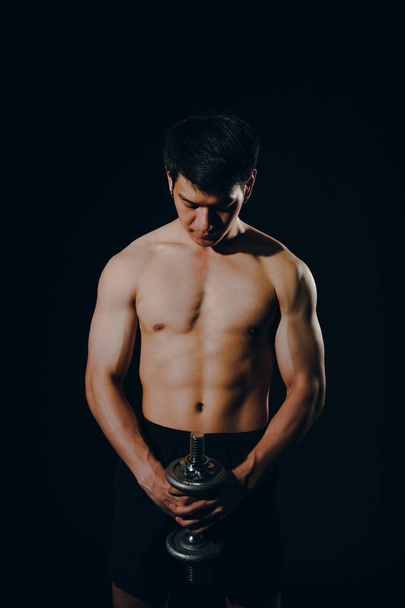 athletic muscular bodybuilder man with naked torso six pack abs  - Fotó, kép