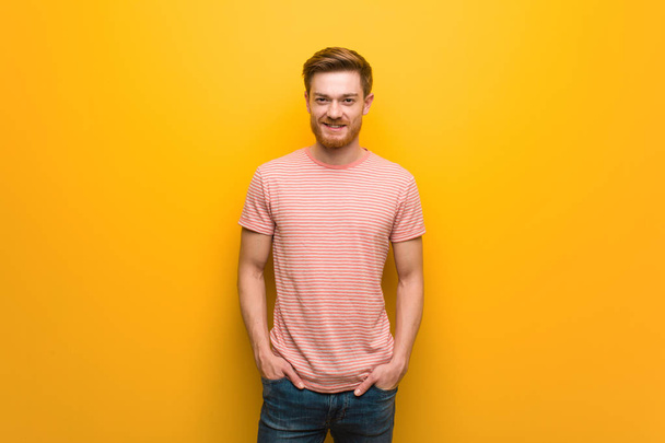 Young redhead man cheerful with a big smile - Photo, Image