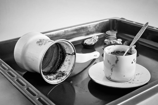 A dirty coffee Cup and saucer and a coffee mug. - Photo, Image