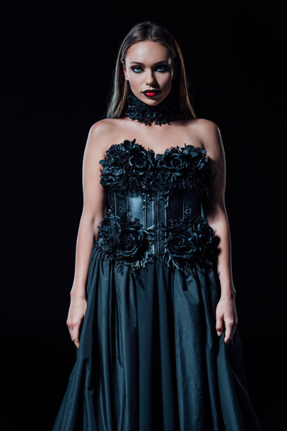 scary vampire girl in black gothic dress isolated on black - Φωτογραφία, εικόνα
