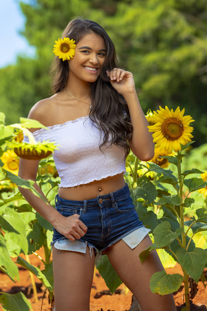 Lovely Asian Brunette Model Posing In A Field Of Flowers - Photo, Image