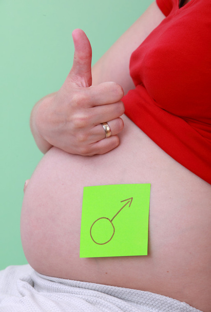 Беременная женщина со знаком Венеры
 - Фото, изображение