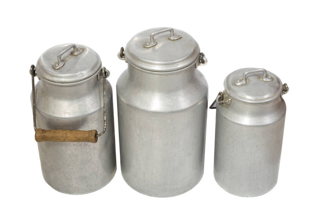 Retro aluminium milk jugs, white background. - Photo, Image