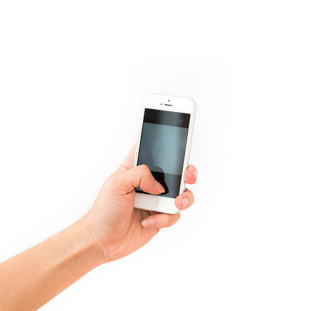 Азіатський чоловік беручи фото з смарт-телефон ізольований на білому - Фото, зображення