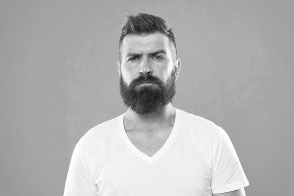 Barber salon. Beard fashion and barber concept. Man bearded hipster stylish beard turquoise background. Barber tips maintain beard. Stylish beard and mustache care. Hipster appearance. Male beauty - Foto, Imagen