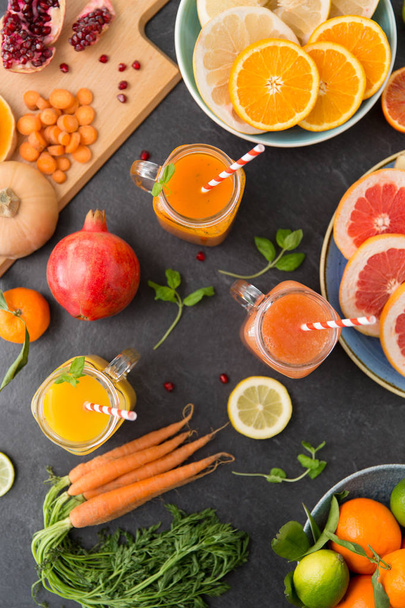 mason jar glasses of vegetable juices on table - Photo, image