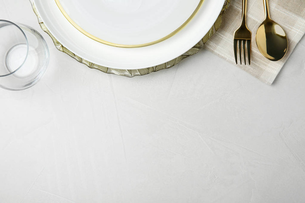 Beautiful table setting on grey background, flat lay. Space for text - Photo, Image