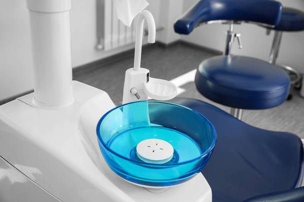 Clean spit sink in modern dentist's office - Фото, изображение